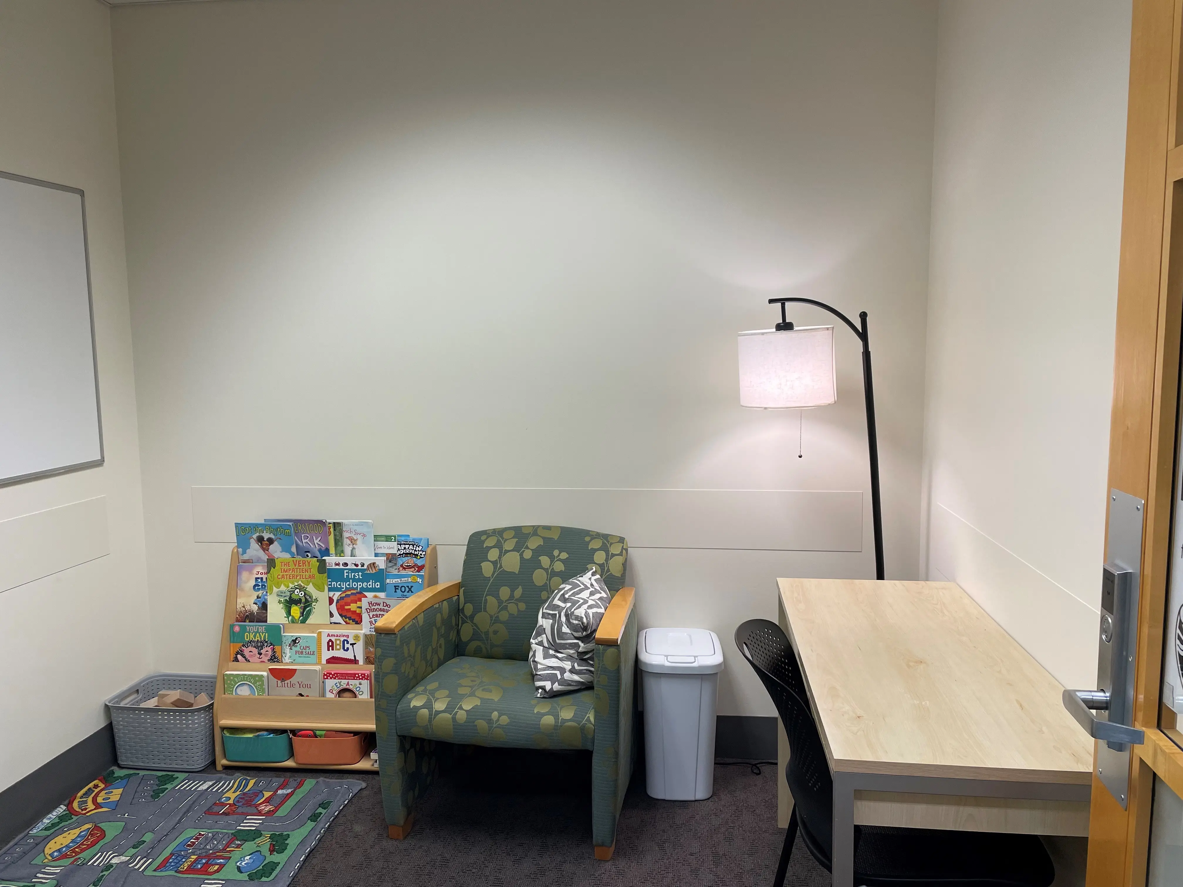 adult desk with children's library rack